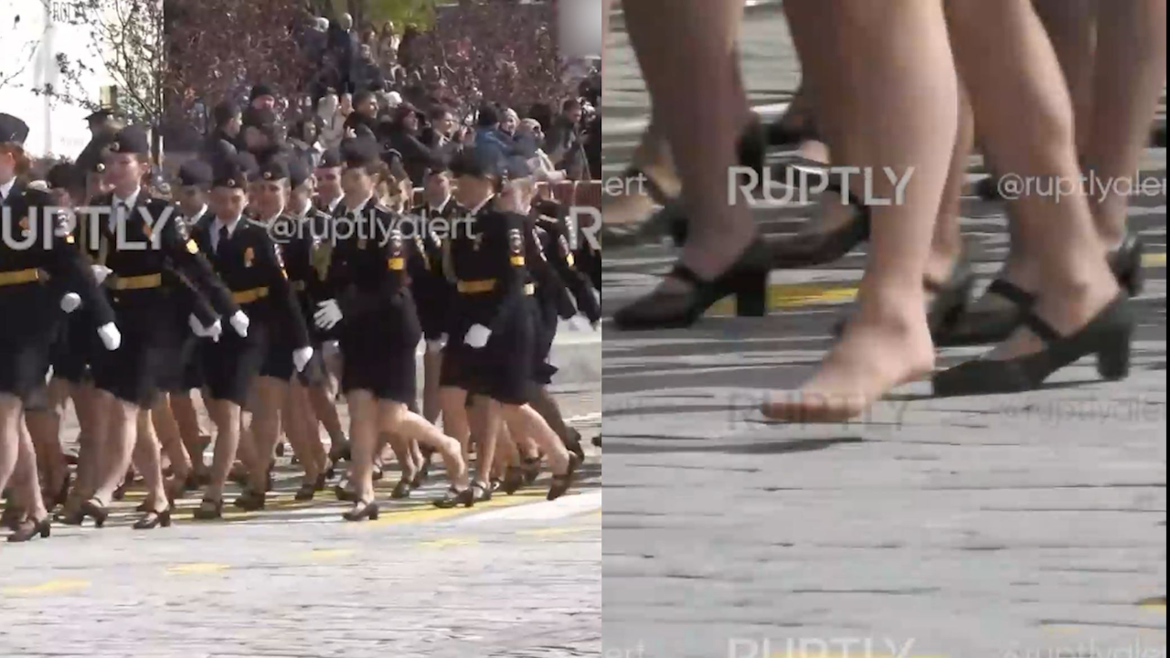 俄胜利日阅兵一女兵掉鞋子 单腿跳回