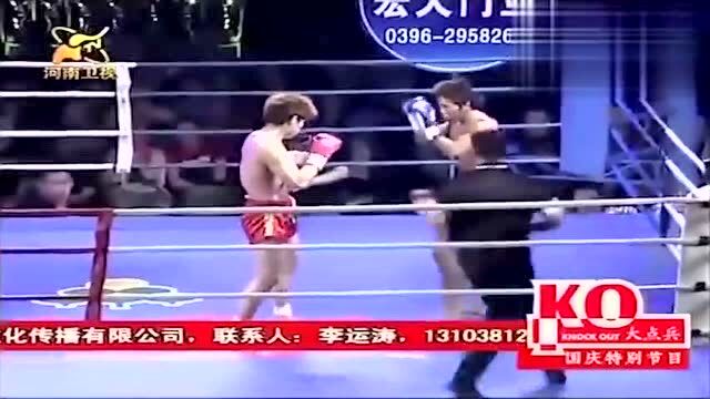 武林风初代王者,“腿神”洪光巅峰一战,两个后手重拳KO日本选手