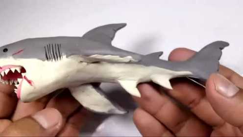 手办玩偶制作秀：用软泥装扮打造一个受伤的鲨鱼