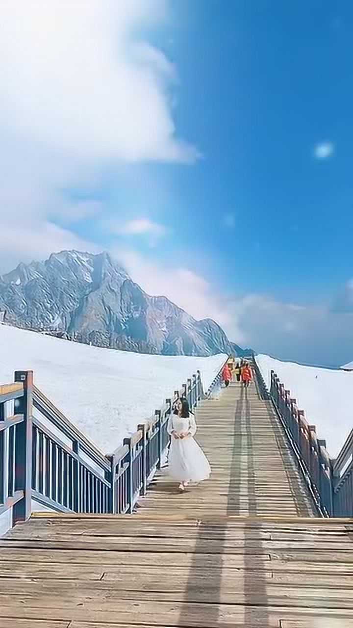 玉龙雪山,再配上美女,如此美景怎能错过?