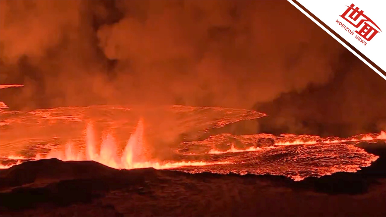冰岛一火山喷发瞬间曝光:亮橙色熔岩喷涌而出 地面现3公里长裂缝