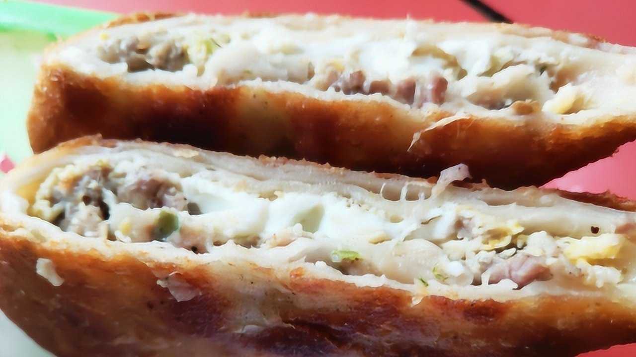 美食之旅来到山东聊城,今天去吃每天都能卖几百个的聊城名吃呱嗒