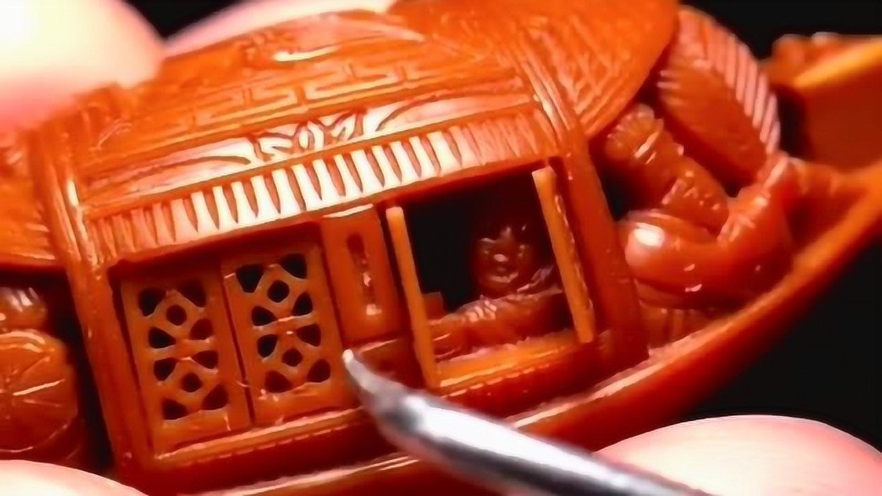 橄榄核雕刻的核舟这就是小时候都要会背的核舟记中国传统文化的魅力