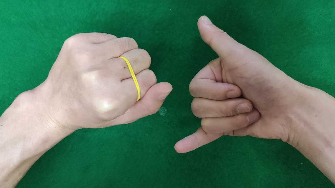 简单易学小魔术:橡皮筋跳跃二指