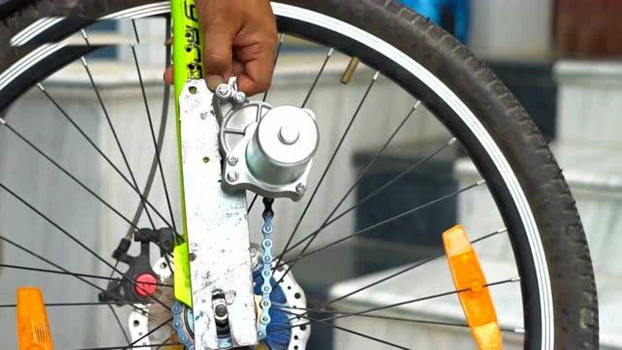 自行车装上小电机改装一辆简易电动车低成本改造