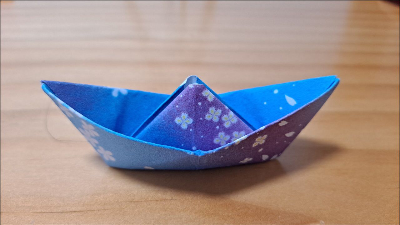 手工折纸80后儿时常玩的小纸船快和宝贝折只小纸船一起支划船吧